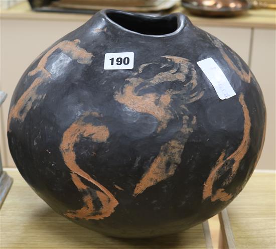 A pottery vessel with brush marks